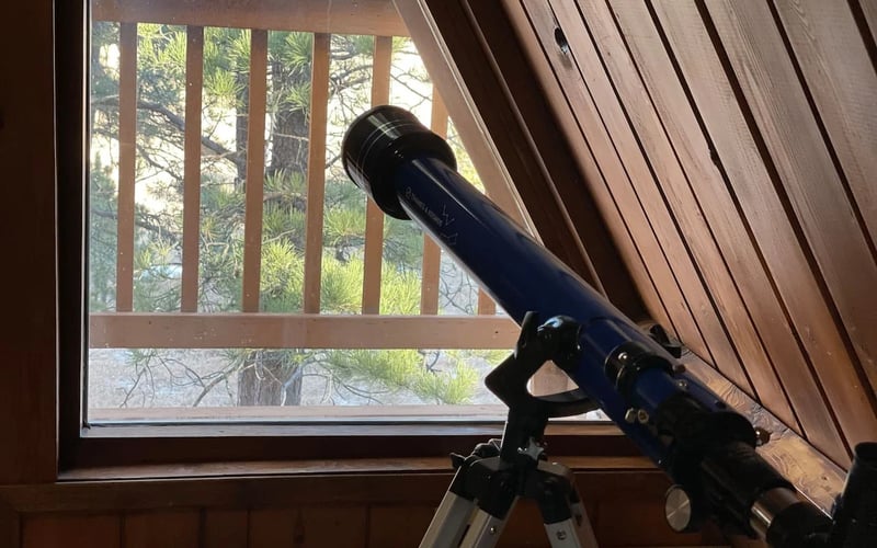 Black Hills Chalet, telescope by the A-frame window